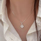holding hengxin s925 sterling silver artistan full drilling four leaf clover necklace female niche design light luxury high level sensing collarbone neck chain