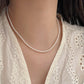 holding s925 sterling silver light luxury pearl bow dual layer stack wearing necklace female korean summer versatile clavicle chain