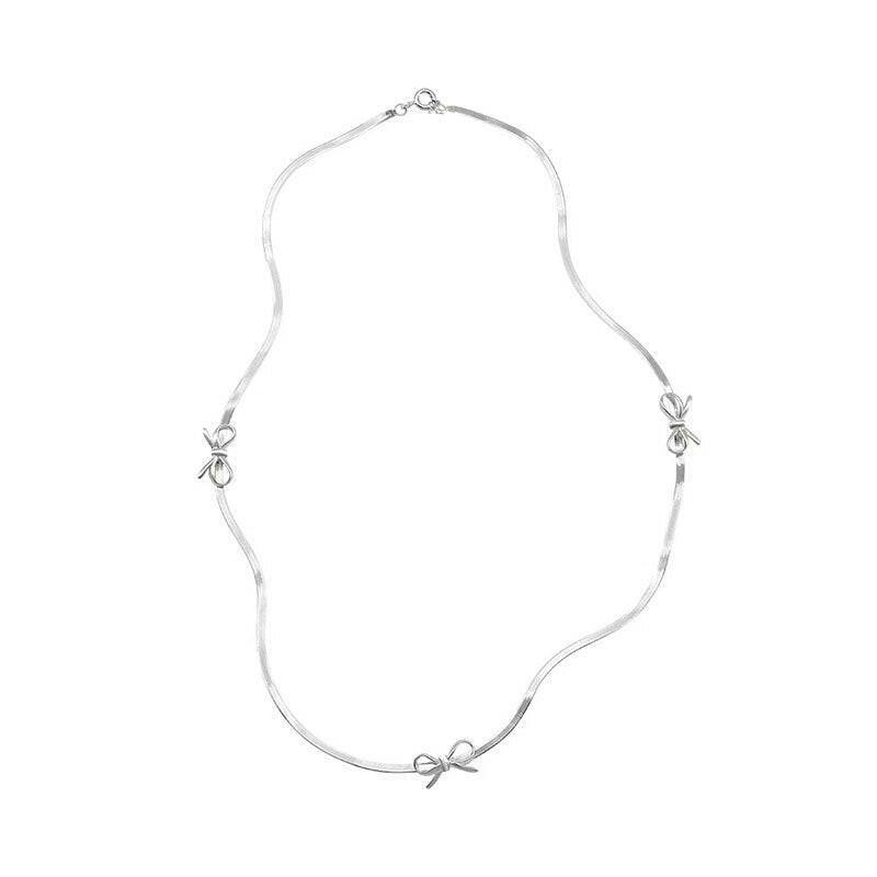 holding hengxin s925 sterling silk bow snake bone chain necklace women 2024 explosion niche senior smart light luxury clasia bone chain