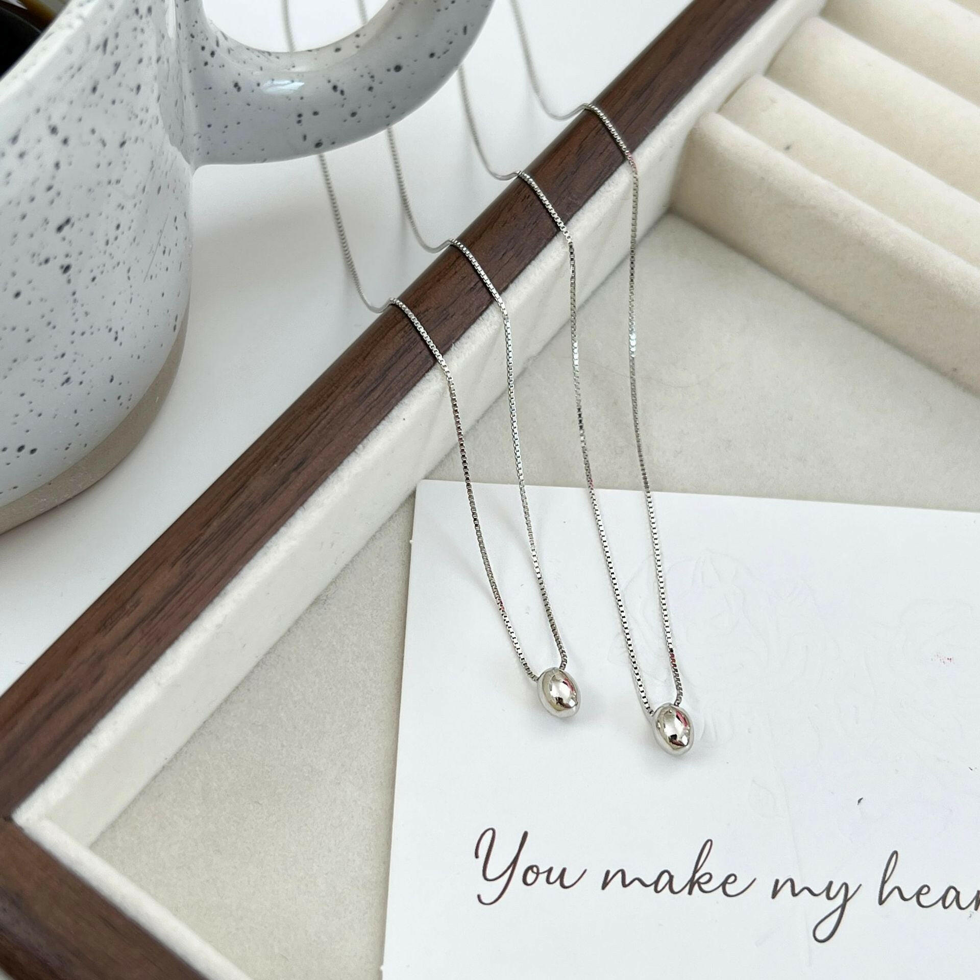 holding hengxin s925 silver silver silver bean celacium celasm chain necklace female korean light luxury niche design 2024 new net red